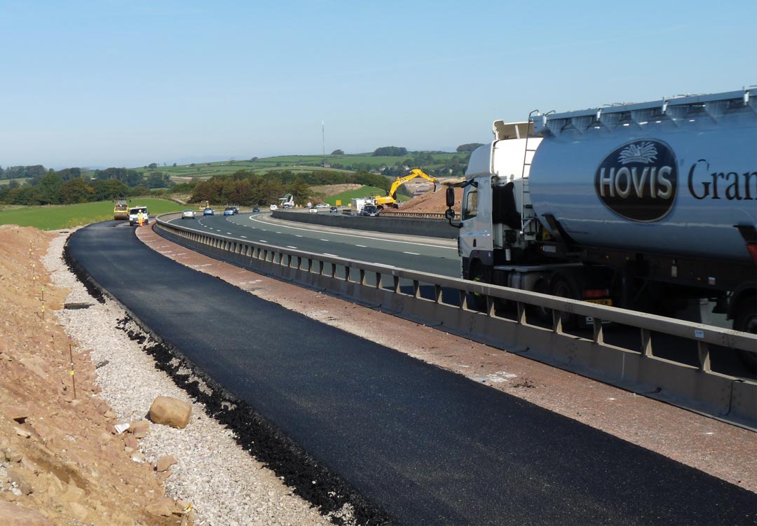 Varioguard installed alongside Lancaster Road for M6 Link Project with lorry driving past